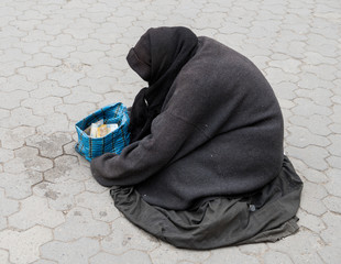 Homeless woman on the street