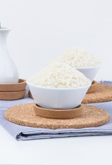 Glass bowl of rice on background,shallow Depth of Field,Focus on rice. 