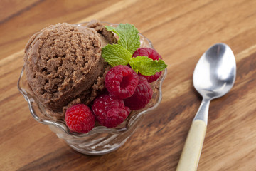 chocolate flavor ice cream with raspberry fruits