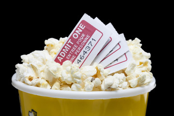 popcorn with cinema ticket in dark