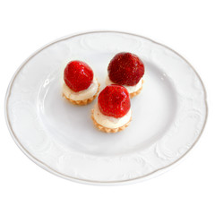 Delicious cupcakes with a strawberry on top