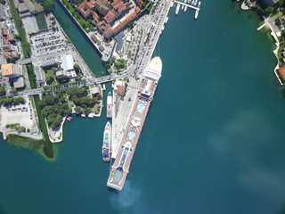 Aerial view of large cruise ship near the pier 
