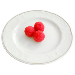 Sweet balls on a white plate