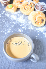 Coffee and snacks on the table.