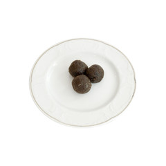 Sweet balls on a white plate