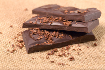Chocolate pieces with a chocolate crumb on a sacking