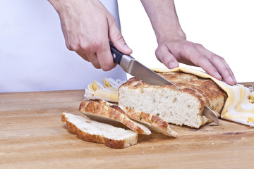a baker cutting the bread