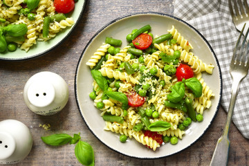Pasta primavera on a vintage plates.