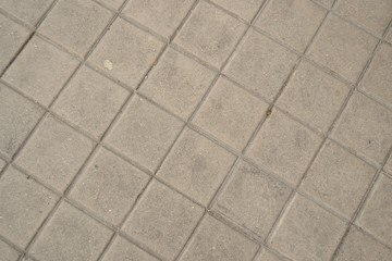 square pavement floor, diagonal lines