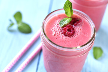 Berry smoothie in a mason jar.