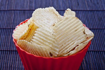 red bowl with potato chips