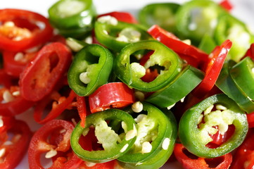 Closeup on red and green chopped chili