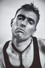 Obraz premium Portrait of a young man with a metallic makeup