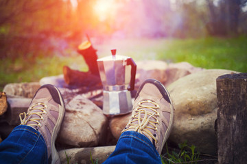 People sitting near the fire.