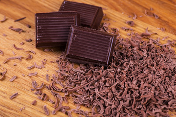 Still life with set of chocolate with coffee grains, closeup
