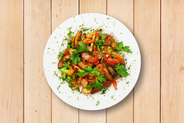 Roasted potatoes with vegetables and mushrooms