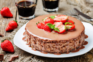 milk chocolate cheesecake with milk chocolate icing and strawber