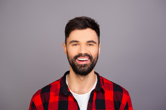 Portrait of cheerful happy man with beaming smile