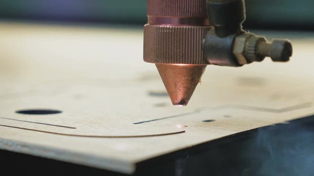 Laser cutting machine at work, close up