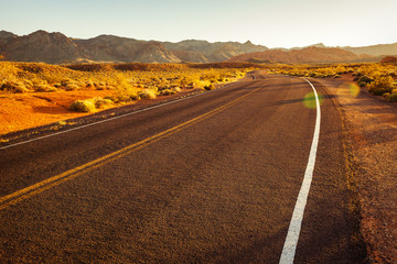 Red sunset over road in southern Nevada, Valley of Fire State Park, USA