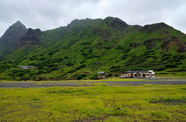 Fototapeta na wymiar Airport and runway under the mountain