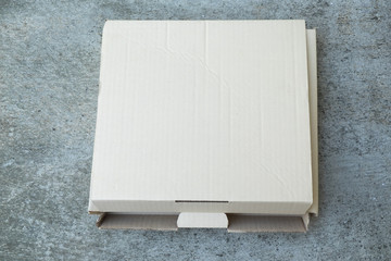 Paper box package on stone