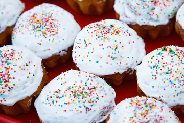 lot Easter cakes decorated with multicolored dusting