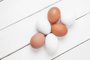 Egg on wooden table.Chicken Egg.  top view