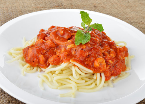 spaghetti pasta with tomato sauce.