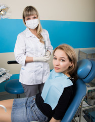 The reception was at the female dentist. Doctor examines the oral cavity on tooth decay. Caries...