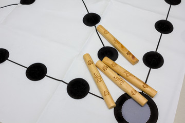 Korean traditional game yut nori, game background and wooden sticks