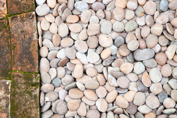 Pebble stones and bricks abstract background