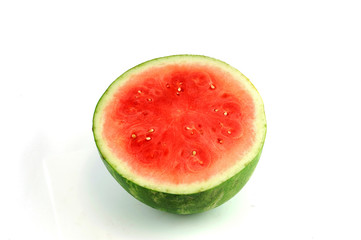 seedless watermelon cut in half on white background