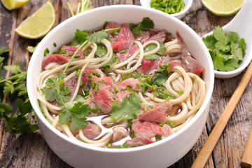 asian noodle and beef soup