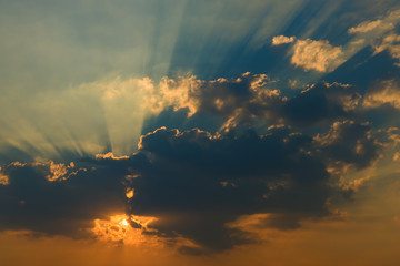 Beautiful sky with clouds and sun rays at sunset