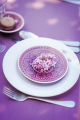 Fototapeta na wymiar Purple Table set for a wedding dinner, vintage style