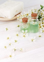 Obraz na płótnie Canvas Flower Aroma water in bottles, soap bar. Fresh natural skin care.
