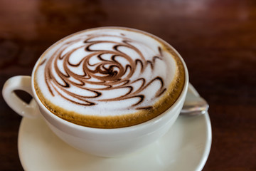 Cappuccino or latte coffee.