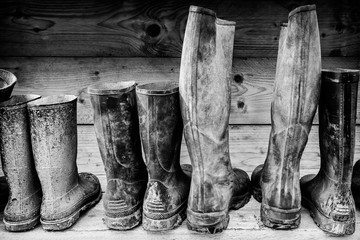 Row of muddy boots