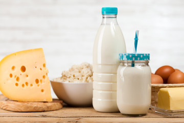 Milk bottle on wooden table