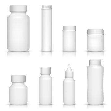 White medical containers set on white background
