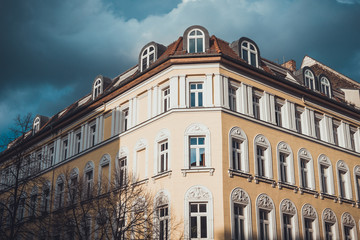 darken sky and yellow house