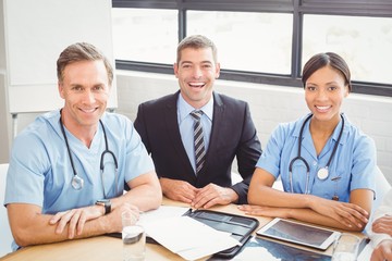 Portrait of medical team smiling in conference room