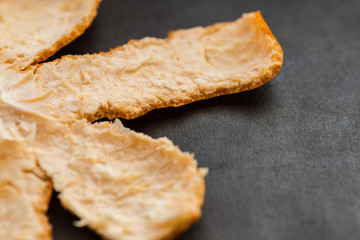 Tangerine (Mandarin) peel on a dark background. Selective focus.