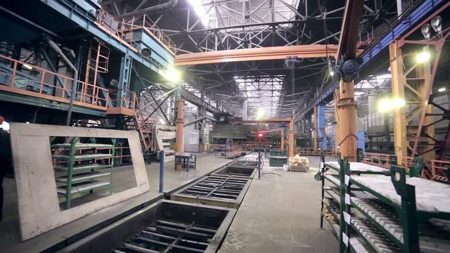Automated robotics welding line at a heavy industry plant. HD.
