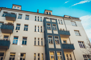 Naklejka premium orange facade with dark balcony