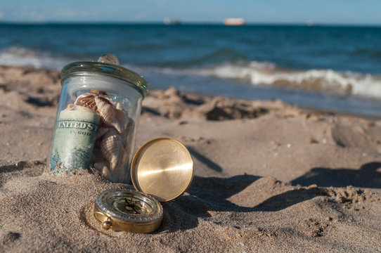 jar with money and compass