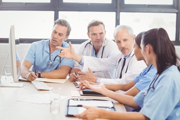 Fototapeta premium Medical team interacting in conference room