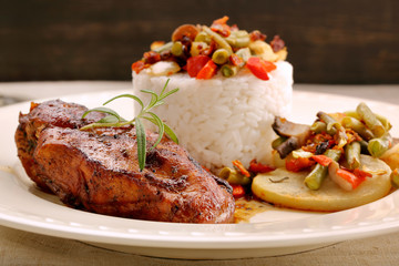 Roast chicken breast with rice and vegetables