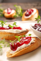 Fototapeta na wymiar Toast with cottage cheese and cranberry jam